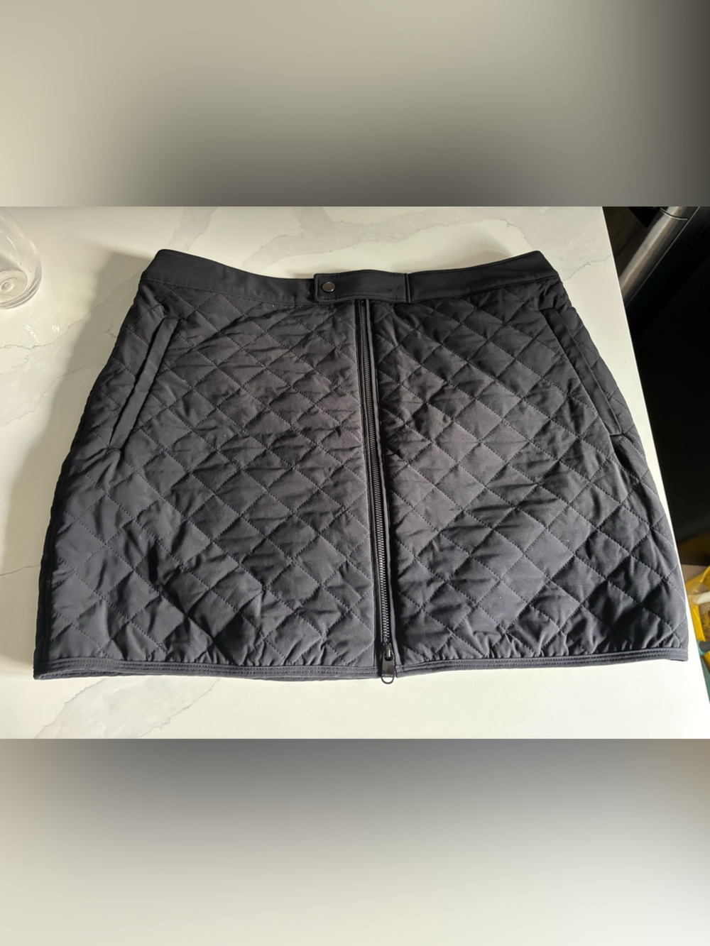 Athleta Black Apres ski Quilted Mini Skirt with Front Zip